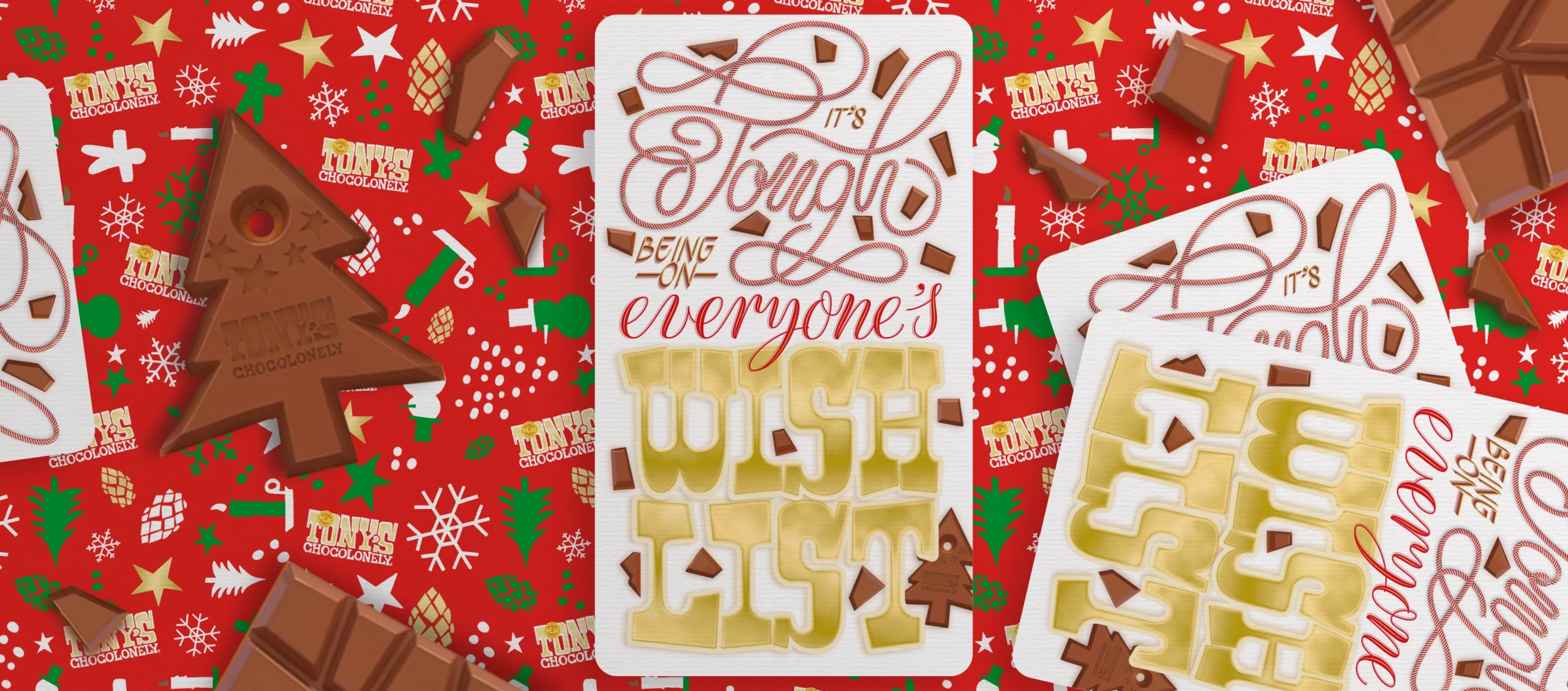 Mock-up depicting the final lettering piece. Background Custom Pattern Red. Text: It’s Tough Being on Everyone’s Wishlist. Part of Portfolio Item: Christmas Message Tony's Chocolonely.