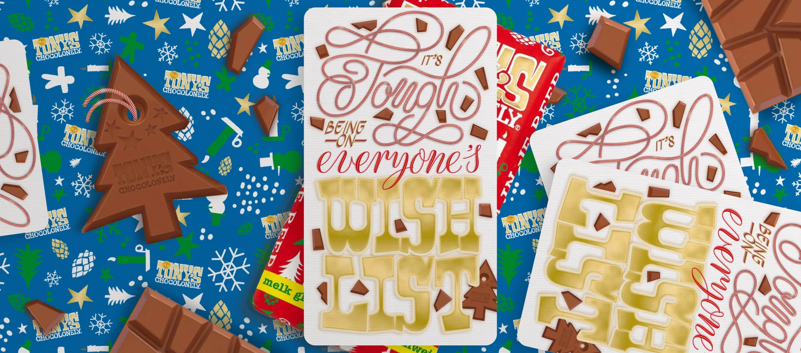 Mock-up depicting the final lettering piece. Background Custom Pattern Blue. Text: It’s Tough Being on Everyone’s Wishlist. Part of Portfolio Item: Christmas Message Tony's Chocolonely.
